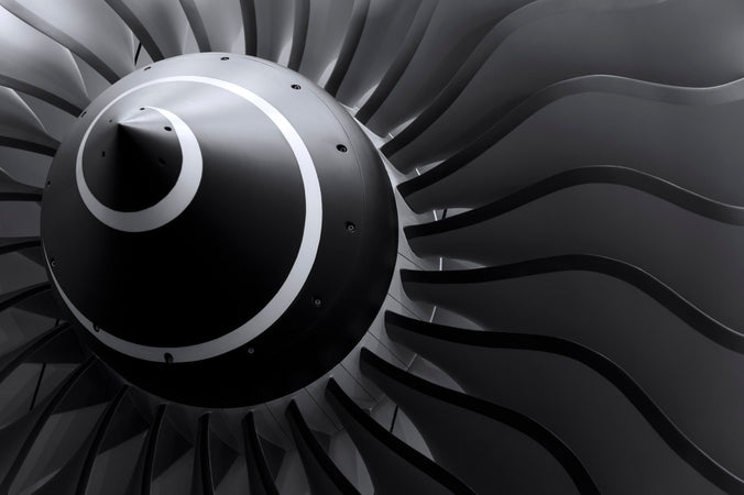 Close-up of a jet engine turbine with intricate details